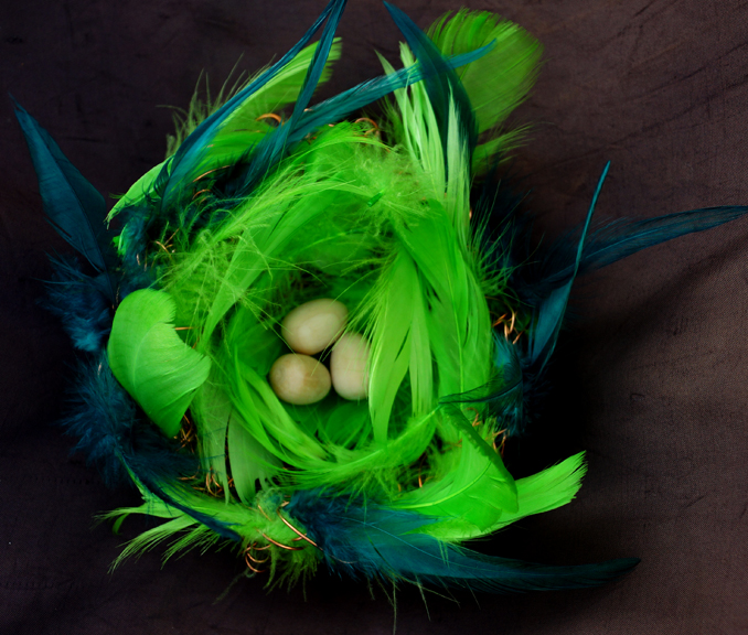 Green feather nest